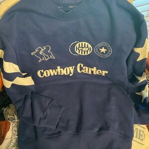 Blue Crewneck Sweater with Gold Accents and Star Design